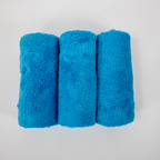 Three folded Speed Society microfiber towels
