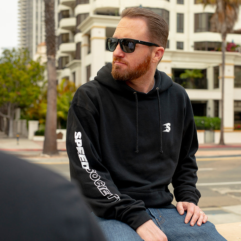 Black Speedline pullover hoodie, front, lifestyle photo